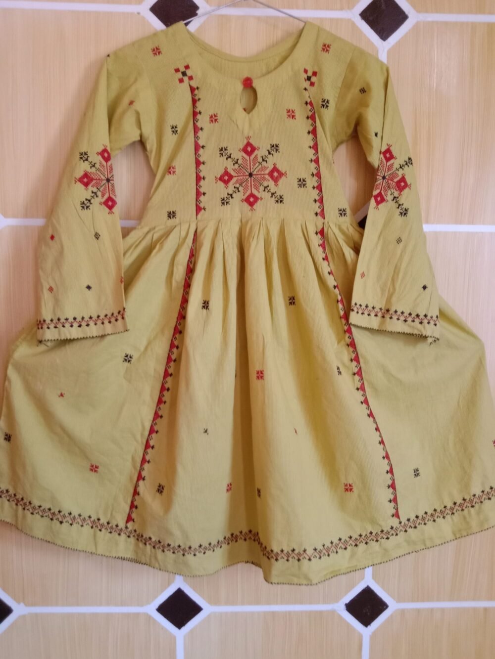 5 Reasons to Choose a Cross Chikankari Chunat Frock Golden for Your Wardrobe