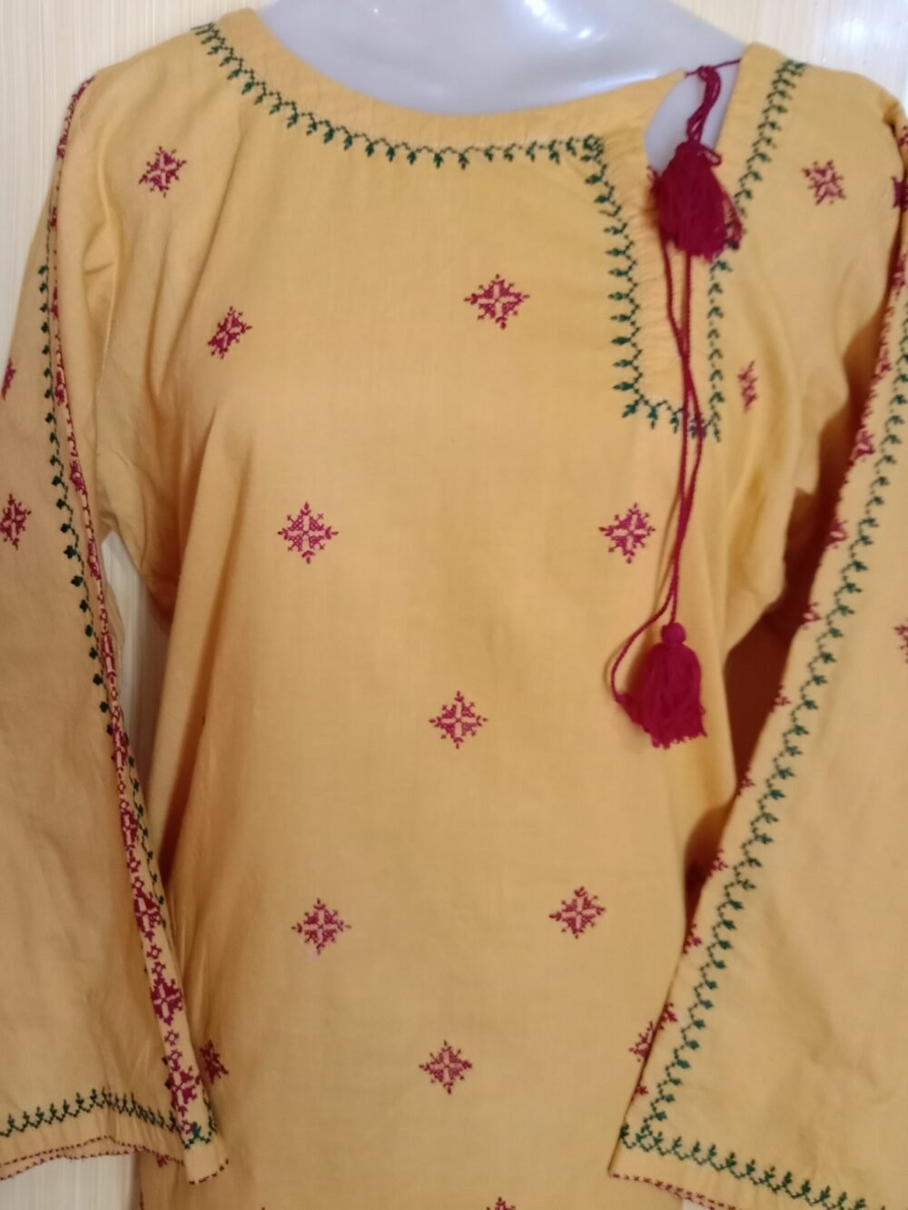 7 Amazing Benefits of Wearing a Cross Stitch Lawn Kurta-Orange - Image 5