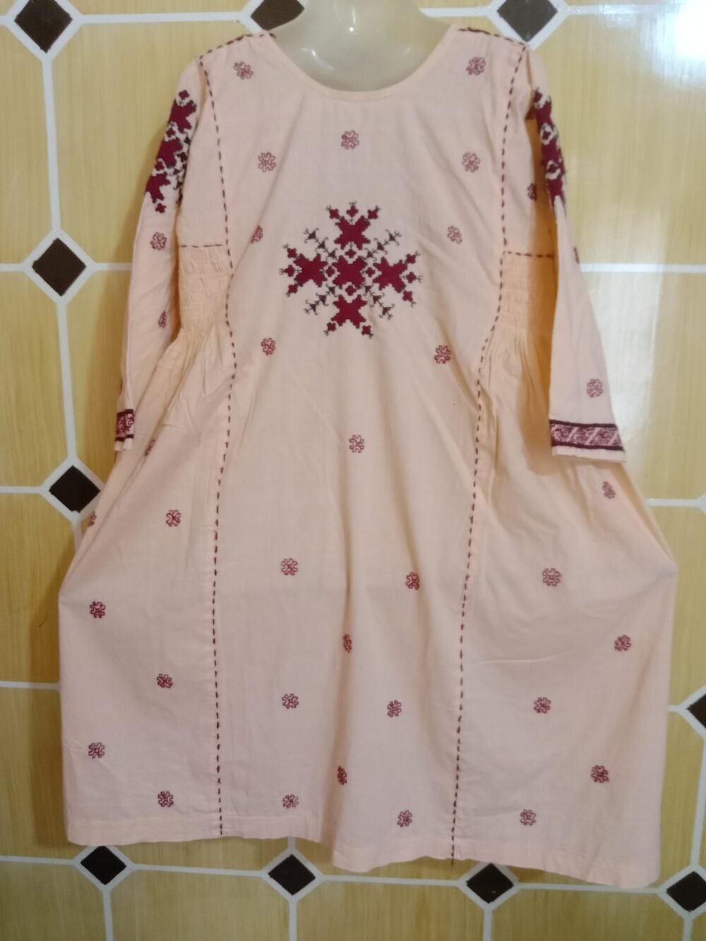 5 Reasons to Elevate Your Wardrobe with a Nawaz Shareef Chikankari Chunat Frock Light Orange - Image 3