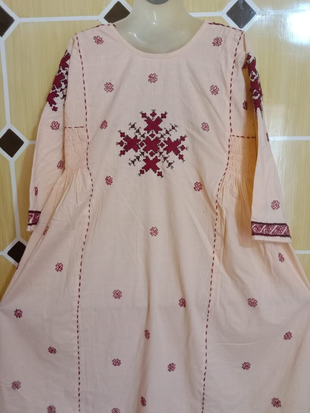 5 Reasons to Elevate Your Wardrobe with a Nawaz Shareef Chikankari Chunat Frock Light Orange - Image 4